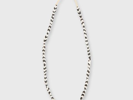 Small Elongated Cowbone Beads in Brown White Zigzag Online Hot Sale